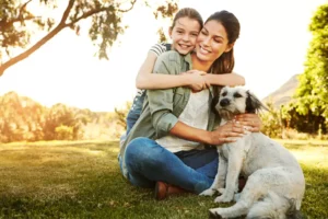 Dog With Child And Owner